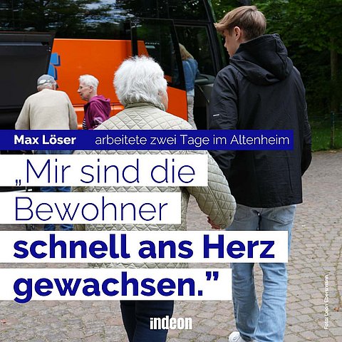 Max Löser begleitet eine Bewohnerin des Hauses an der Hand zum Bus. 